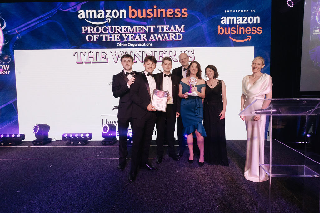 A winning team receiving their trophy